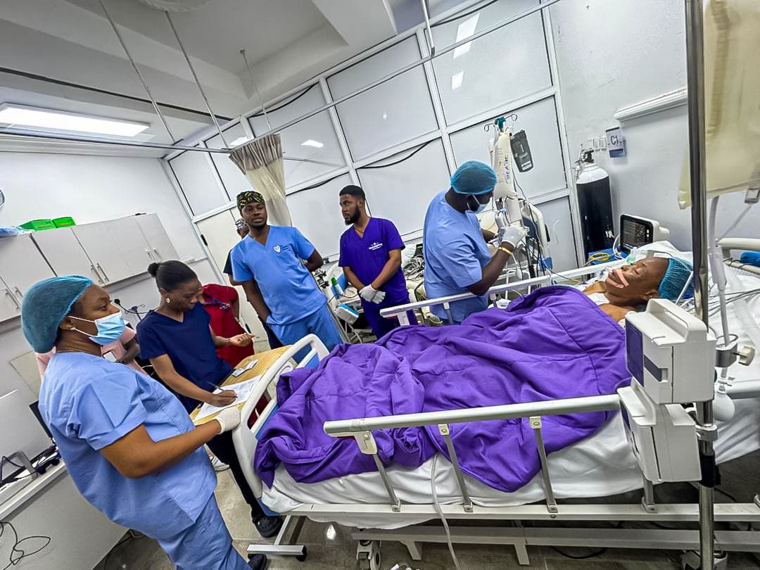 Team brief at the bedside immediately after a case.